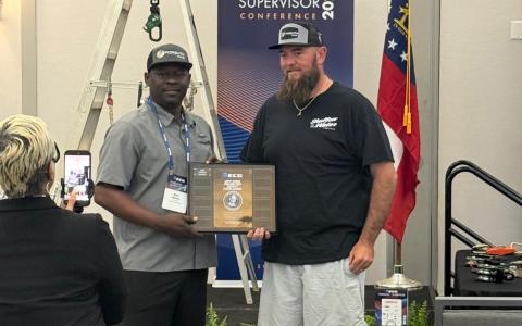 Employees accepting the award