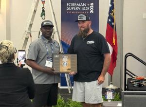 Employees accepting the award